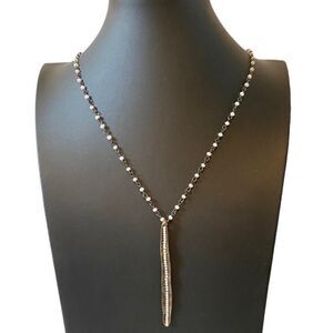 Beautiful extra long brass colored chain w/ tiny faceted iridescent beads.